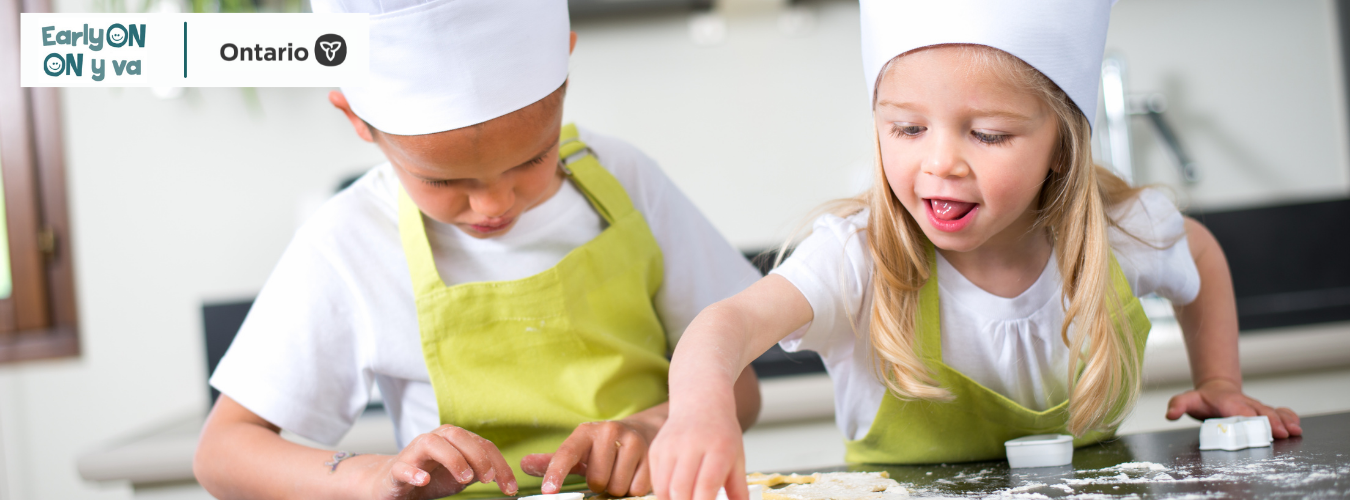 Logos for EarlyON and Ontario over photo of boy and girl baking with chef hats